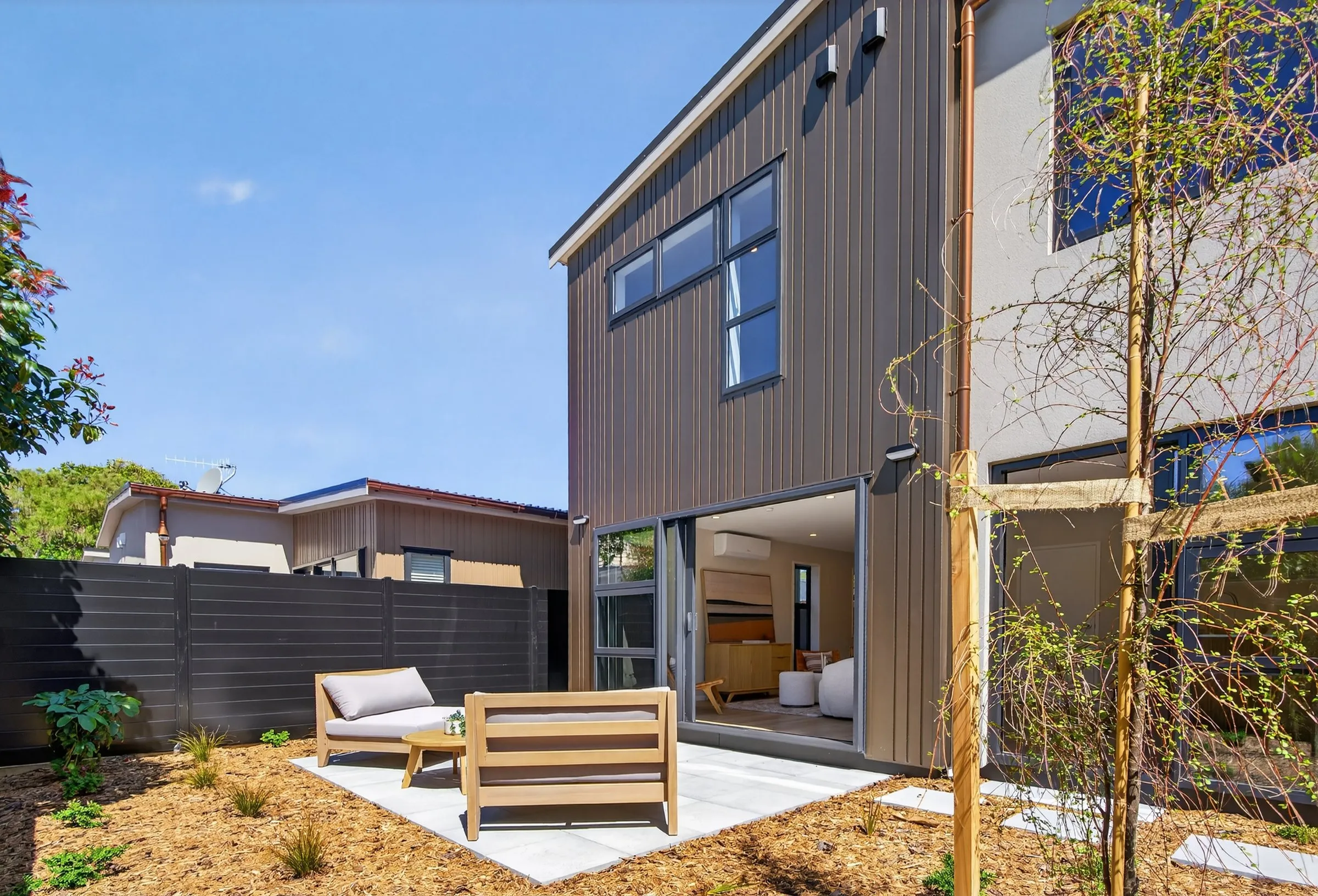 Sunny terrace with outdoor furniture