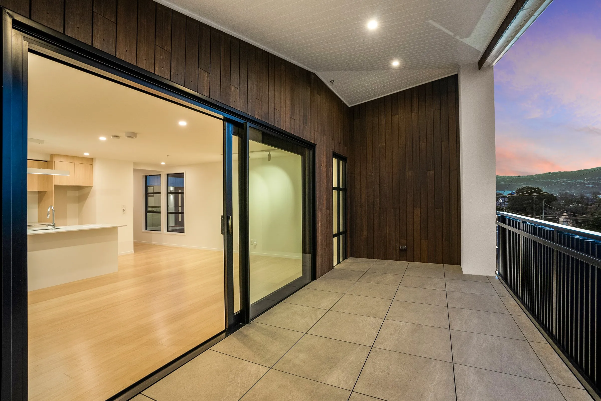 Covered balcony with timber cladding