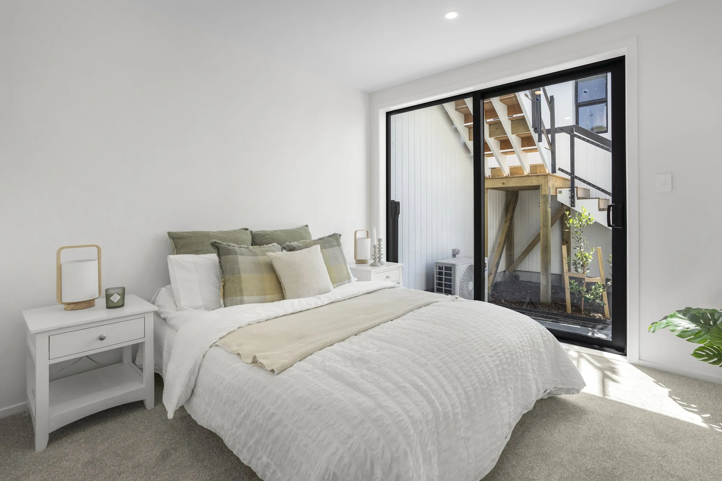 Bedroom with a large window